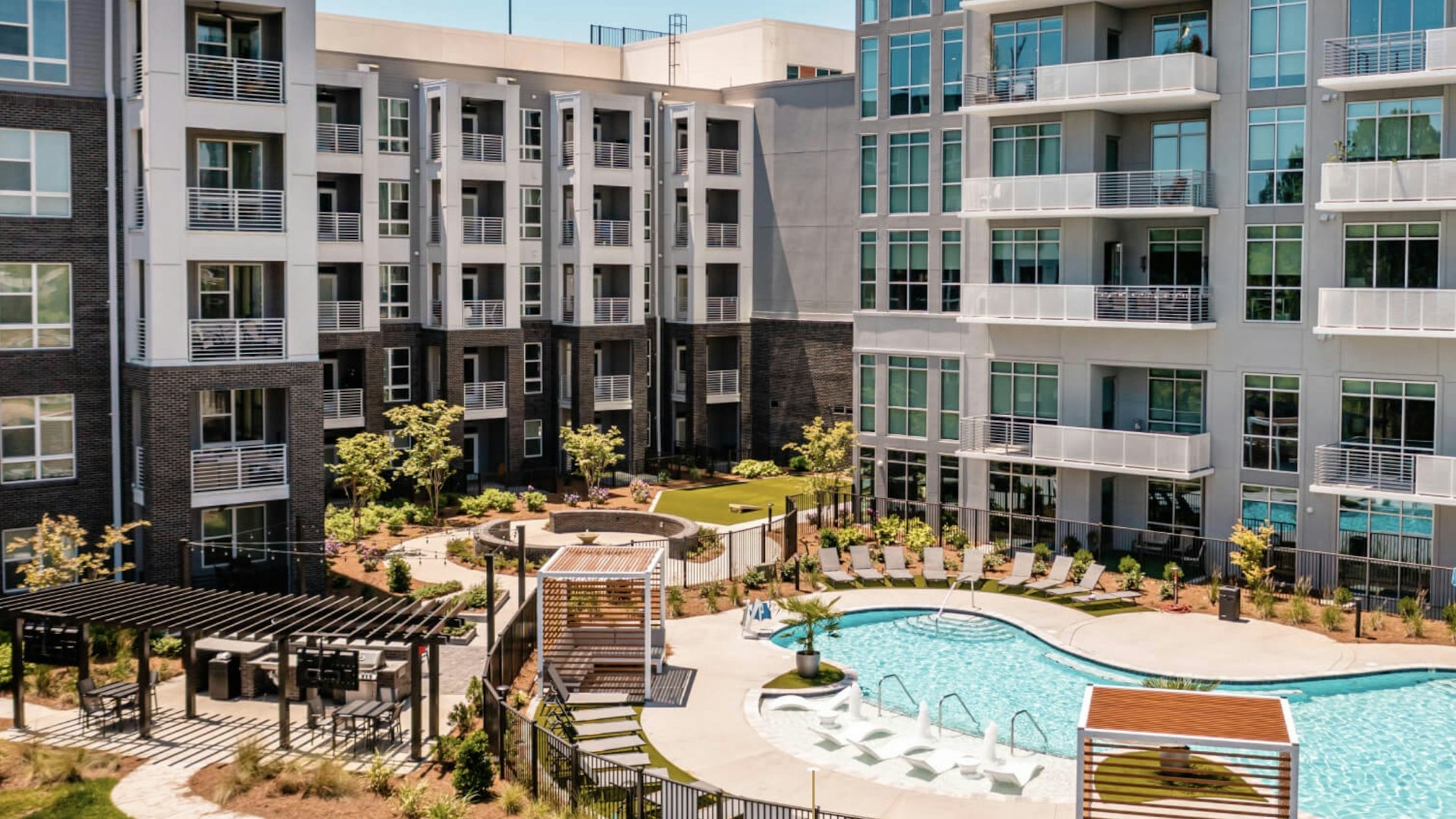 Aerial view of Towerview apartments and pool amenity space