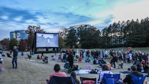 Outdoor movie night with project film on large screen2