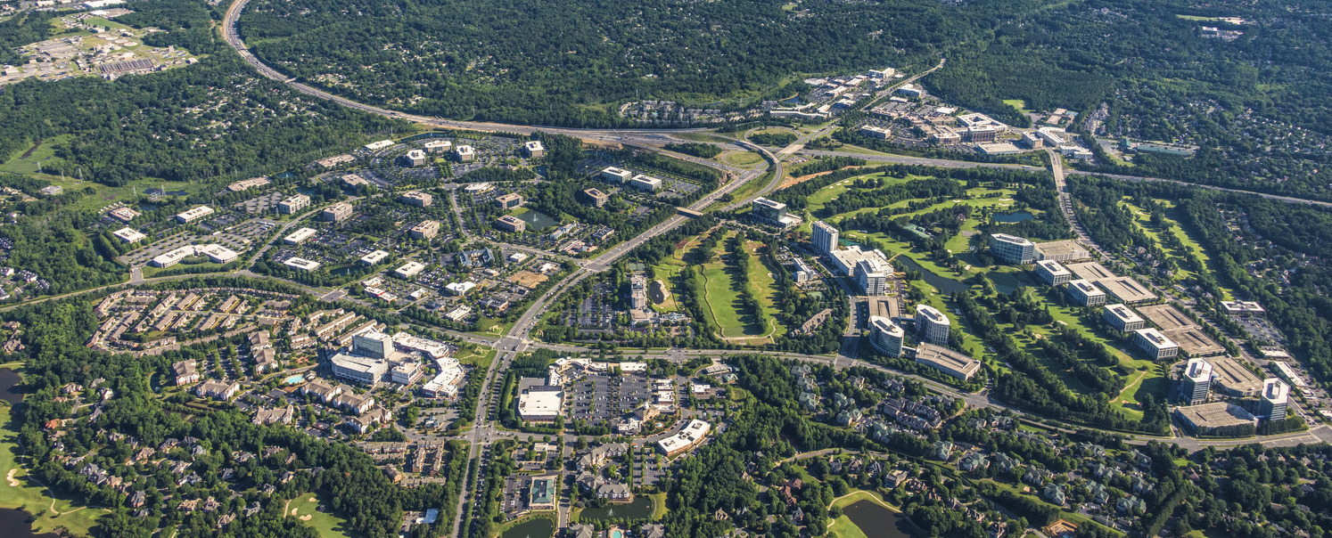 Aerial of Ballantyne campus and tree canopy