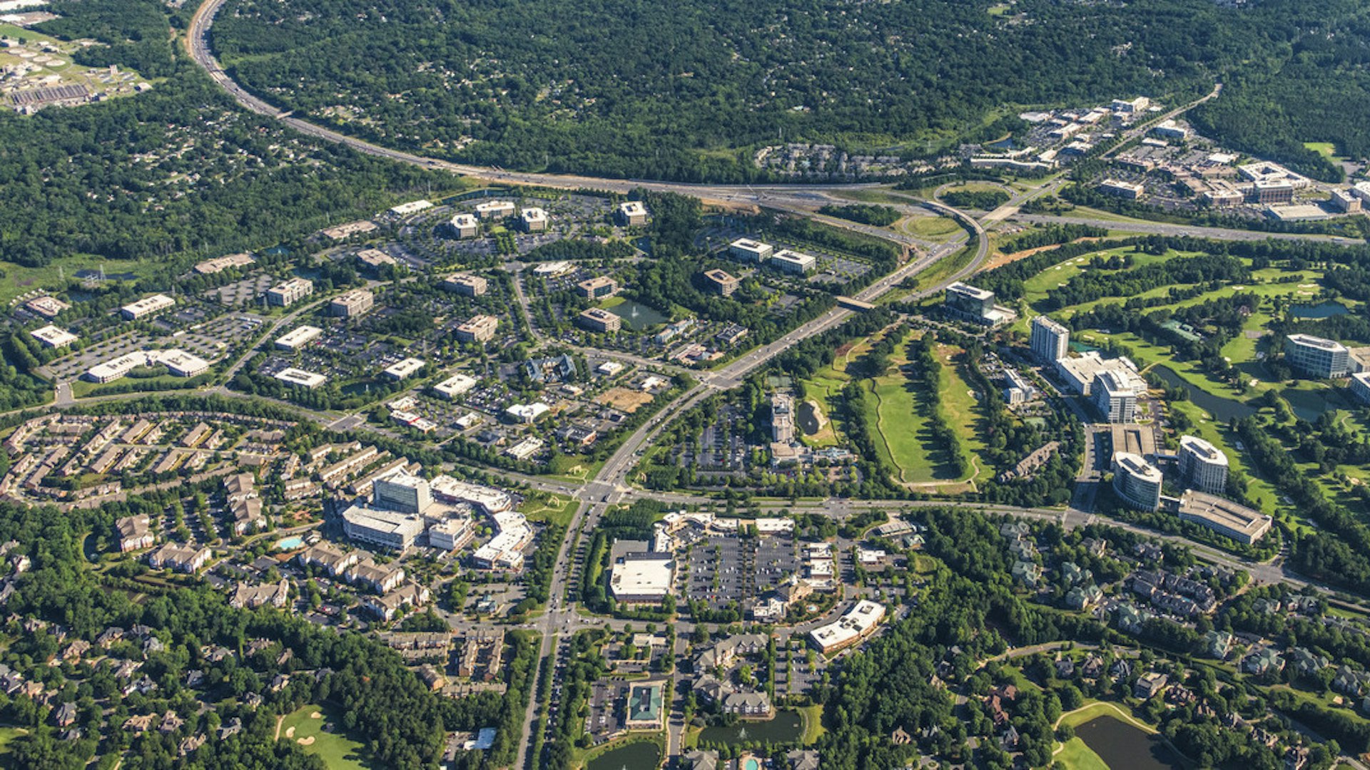 Aerial of Ballantyne campus and tree canopy