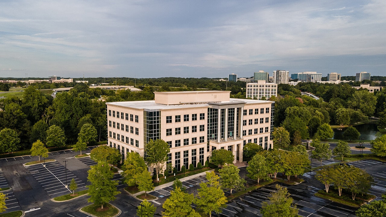 Drone view of parking lot and Crawford Building exterior on Ballantyne Campus4