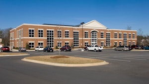 Parking lot and Gibson Building on Ballantyne Campus3