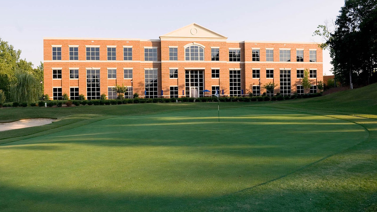 Exterior and green of Gibson Building on Ballantyne Campus1