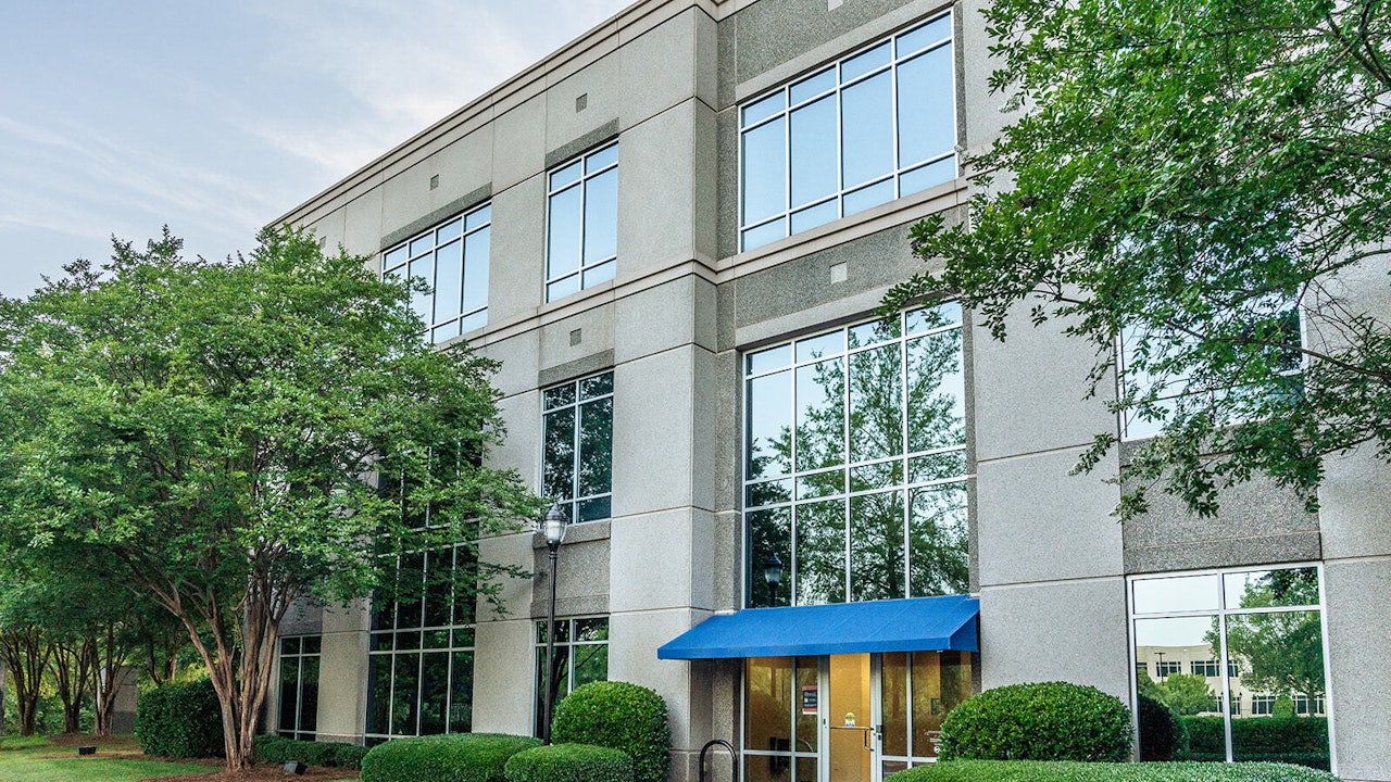 Side entrance of Hall Building exterior on Ballantyne Campus1