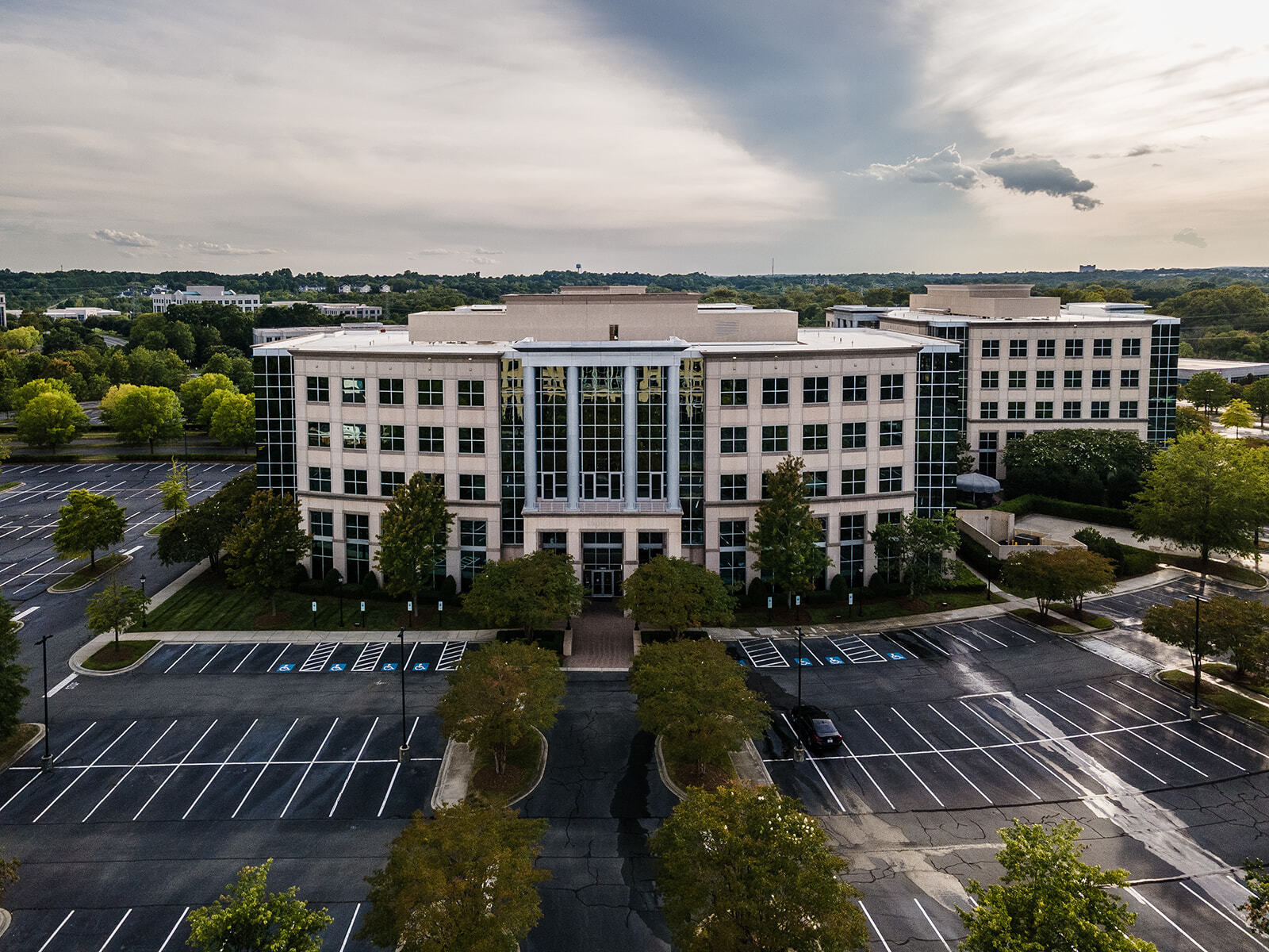 Drone view of parking lot and Simmons Building exterior on Ballantyne Campus3