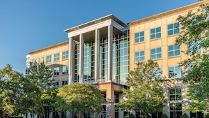 Sunset of Simmons Building exterior on Ballantyne Campus2